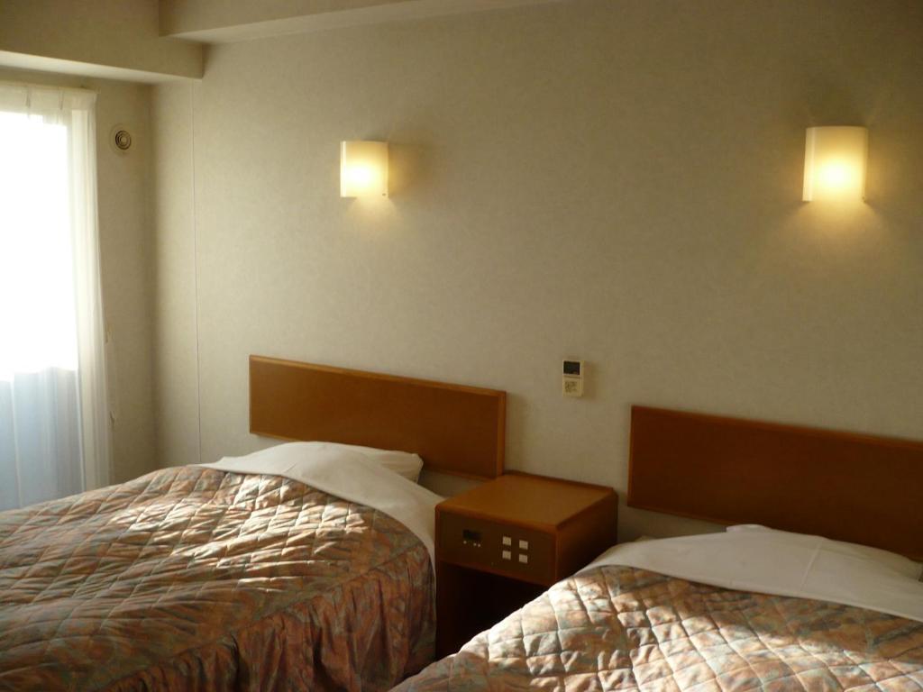 Hotel New Budget Muroran Rom bilde